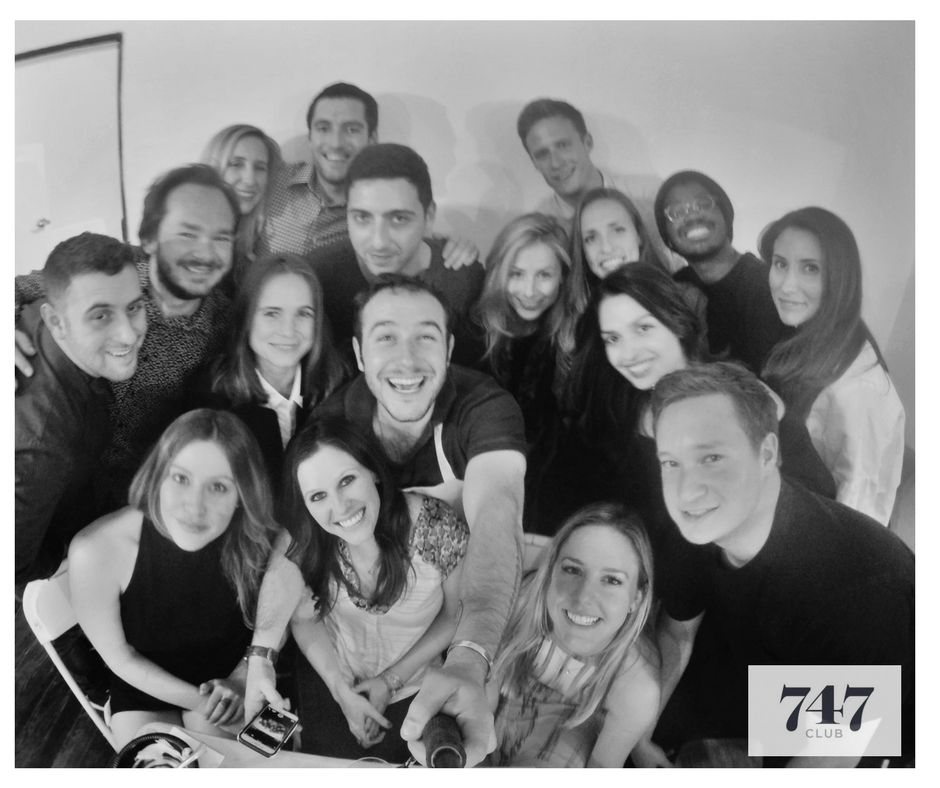 Guests gathered around a 7:47 dinner table