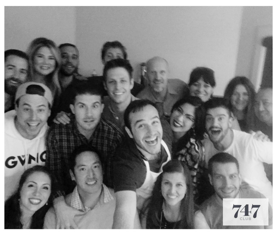 Guests gathered around a 7:47 dinner table