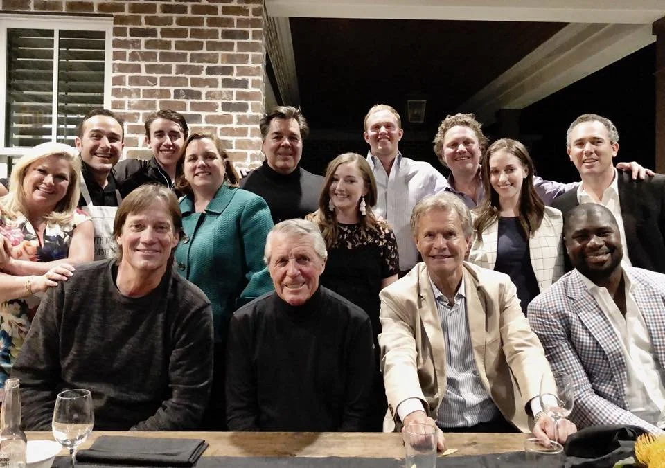 Chris Schembra with guests around a dinner table at a Gratitude Experience